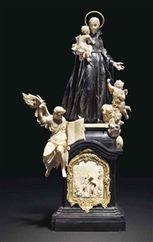 A CARVED EBONISED, EBONY AND IVORY GROUP OF SAINT STANISLAS KOSTKA Attributed to Johann Georg Schnegg